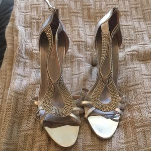 Silver heels worn once to a wedding.